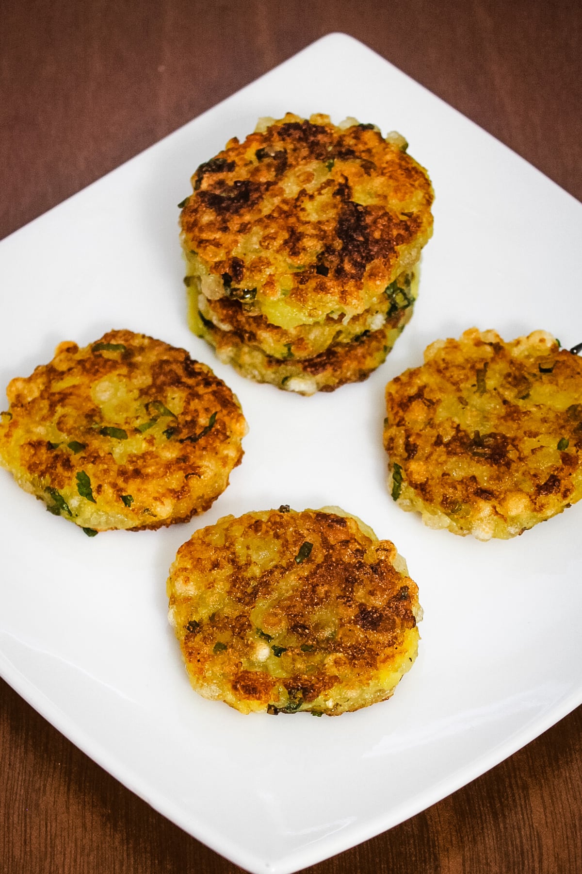 sabudana tikki in a white square plate