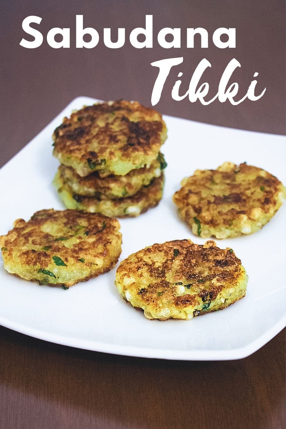 sabudana tikki in a plate with text on top of the image for pinterest