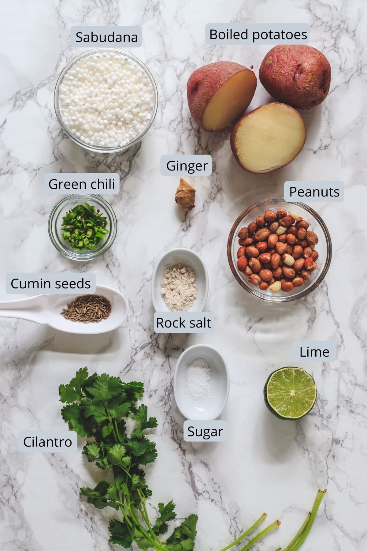ingredients used in sabudana vada includes tapioca, potatoes, peanuts, ginger, green chili, cumin seeds, rock salt, sugar, lime, cilantro