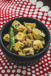 Close up of suran saji in a bowl with red polka dot napkin underneath