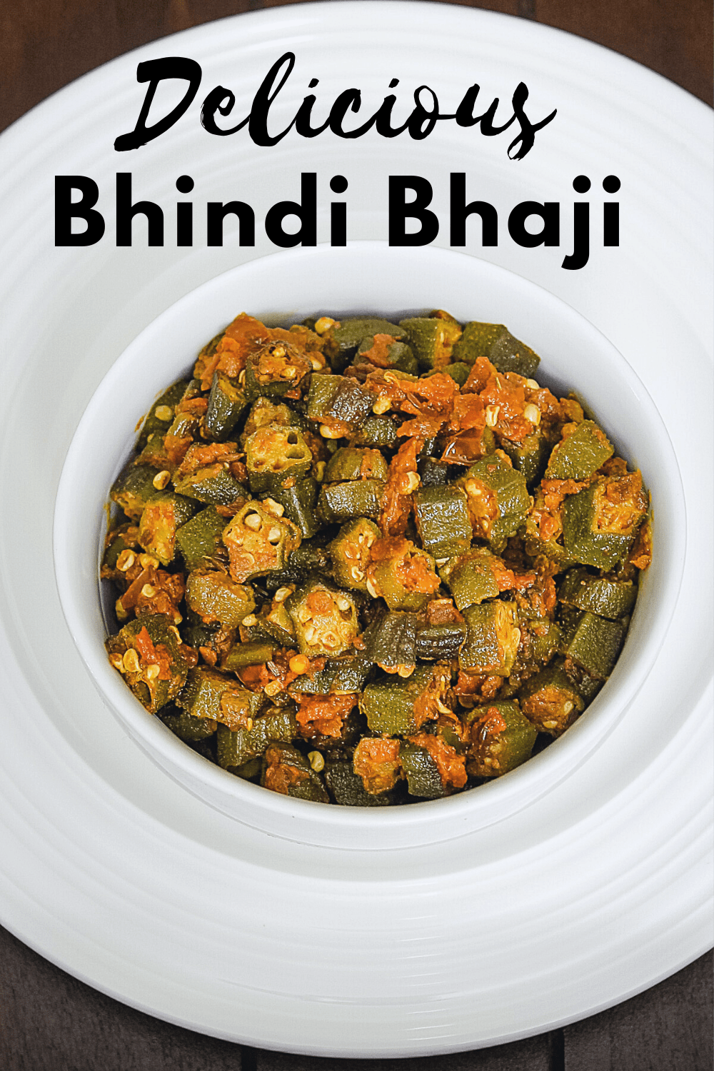 Bhindi bhaji served in a bowl with text on the image for pinterest