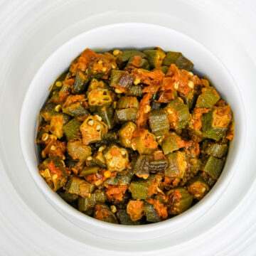 Bhendi chi bhaji served in a white bowl.