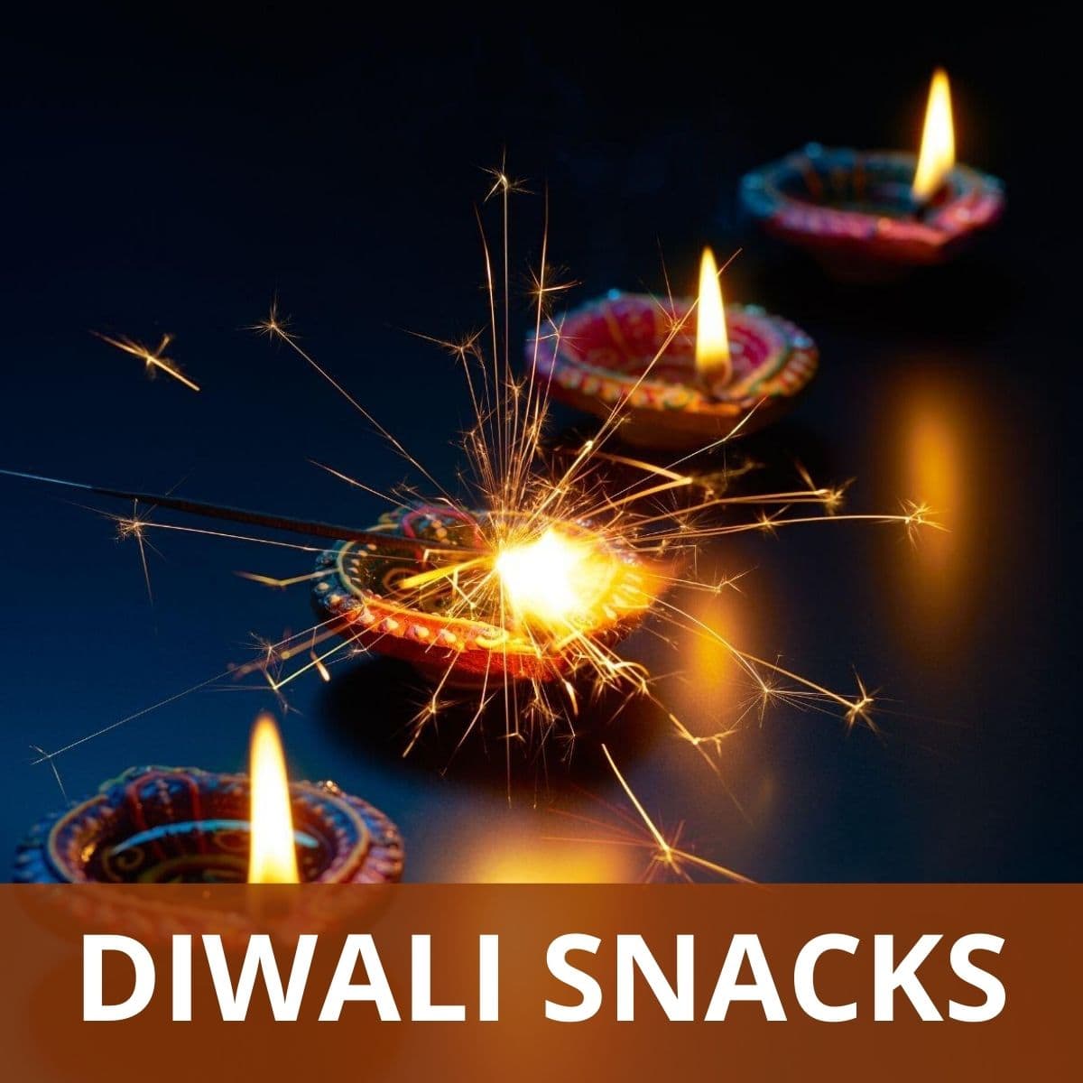 4 diyas in a line with text 'Diwali snacks' on the image