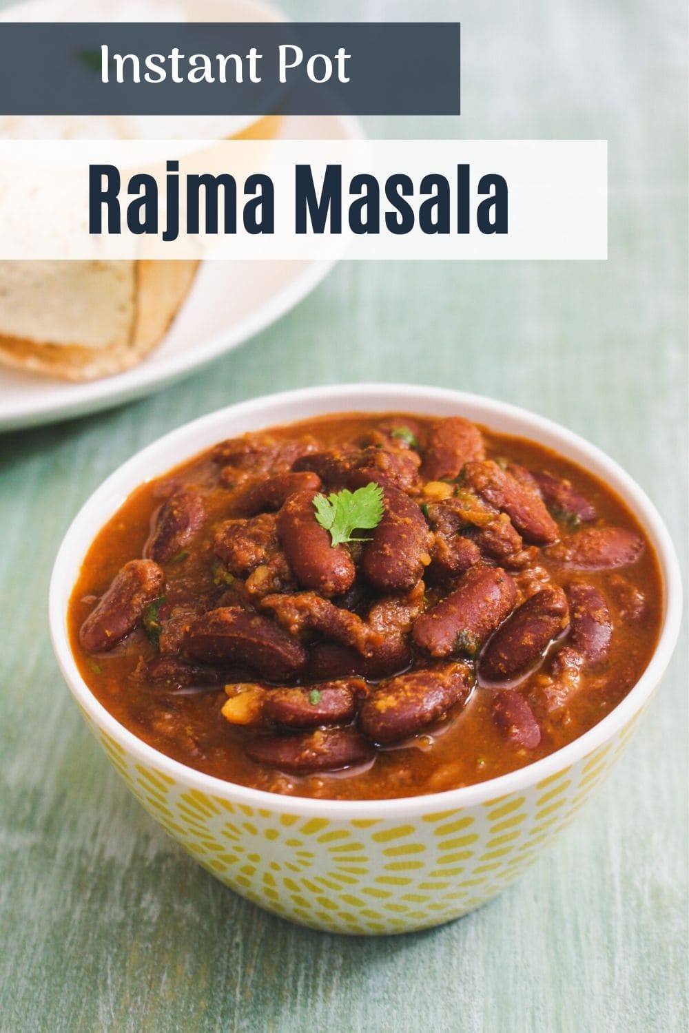 Rajma curry in a bowl with a garnish of cilantro, text on the image for pinterest.