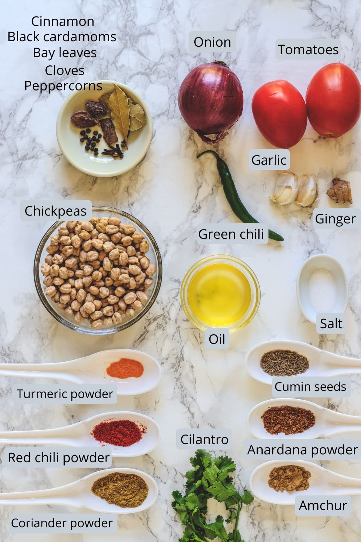 Ingredients used in chole includes chickpeas, onion, tomato, ginger, garlic, chili, oil, salt and spices.