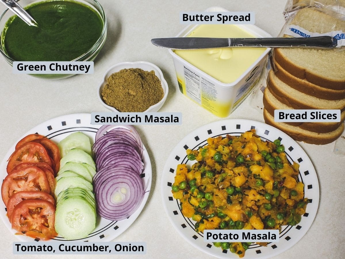 Elements used in toast sandwich includes bread, butter, chutney, sandwich masala, potato masala and veggie slices.