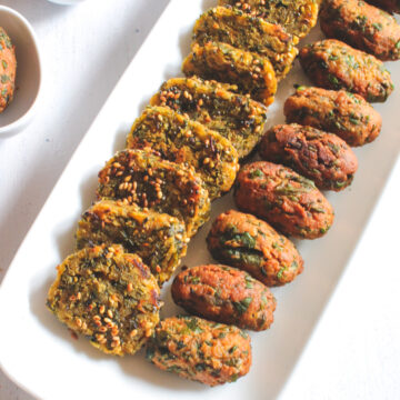 Steamed and deep fried methi muthia in a plate.