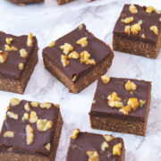 No bake brownie pieces placed on the marble surface.