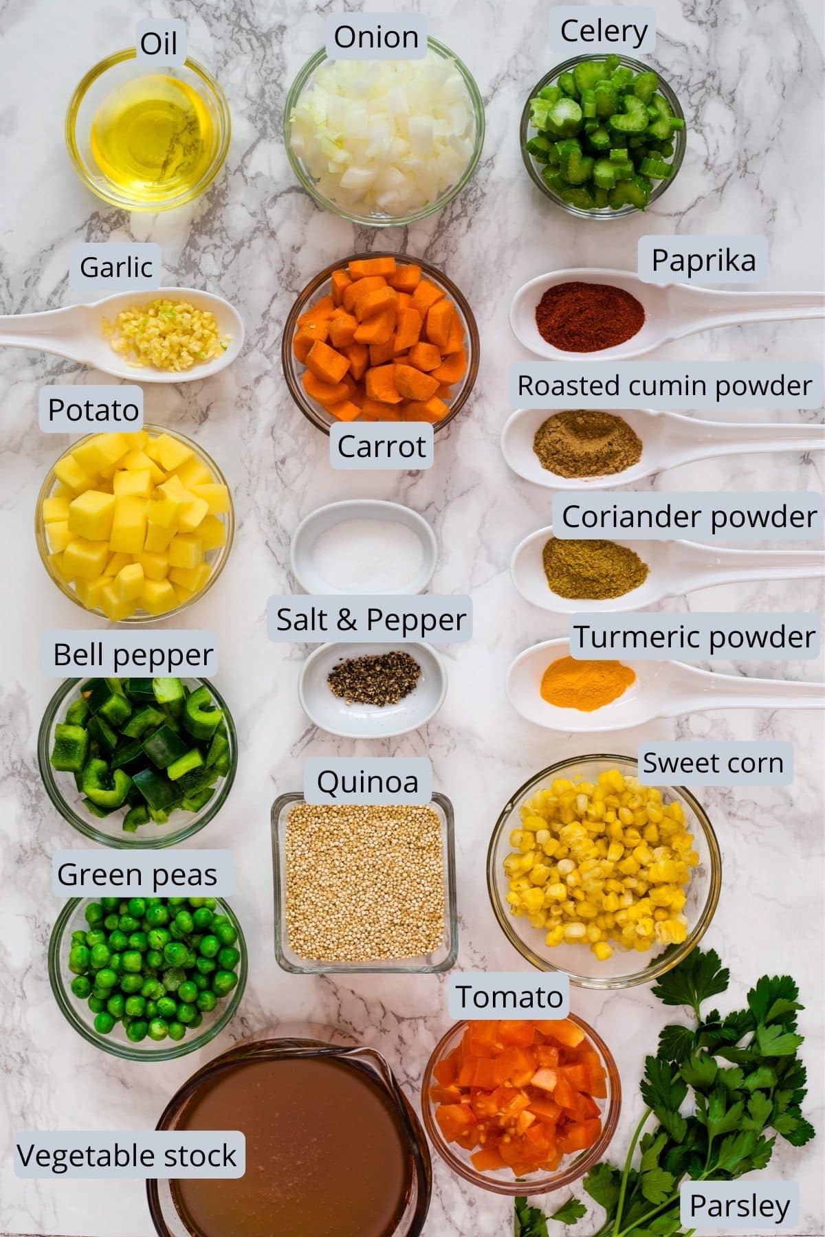 Ingredients used in quinoa vegetable soup includes quinoa, different vegetables, oil, salt, pepper, spices, stock and parsley.