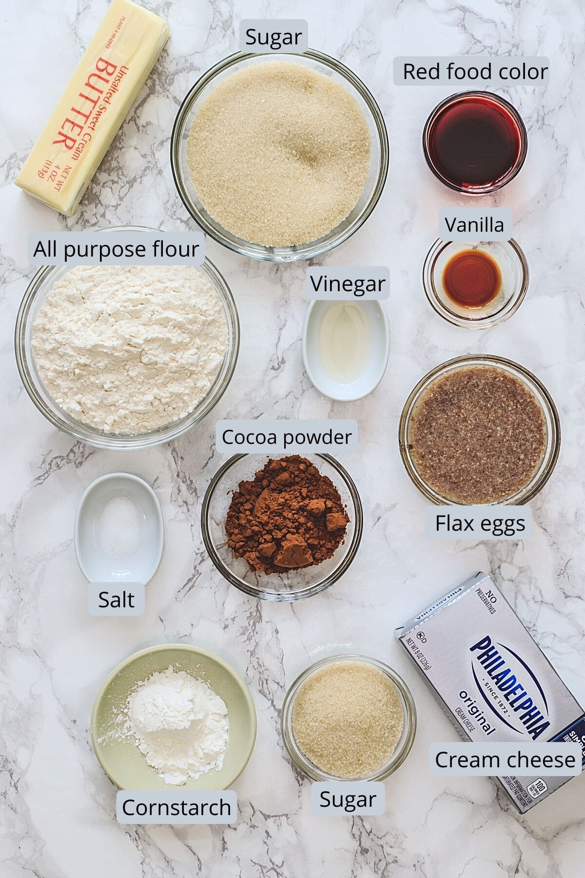 Ingredients used in red velvet brownies includes flour, sugar, cocoa powder, butter, cream cheese, cornstarch, food color, vanilla, vinegar, flax eggs.