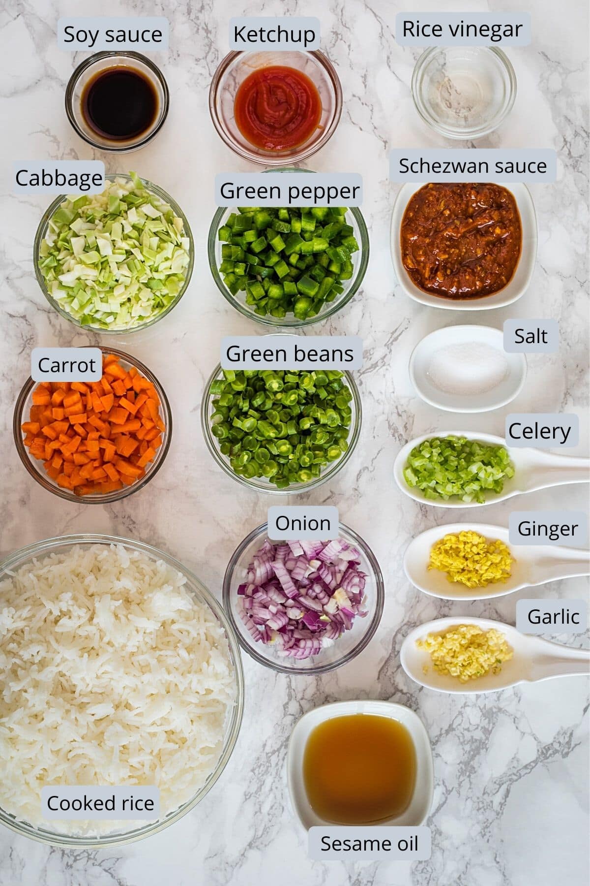 ingredients used in schezwan fried rice includes rice, veggies, oil, salt and chinese sauces.