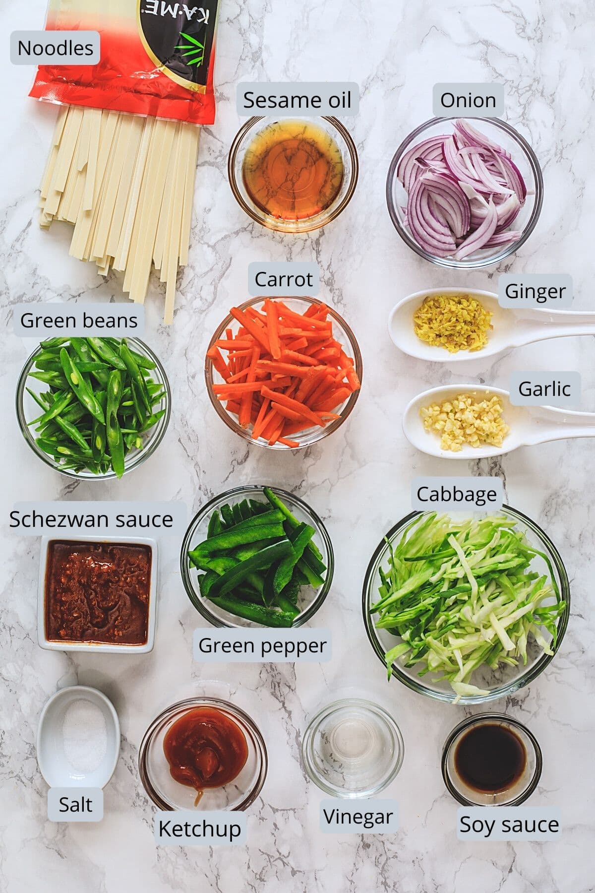 Ingredients used in schezwan sauce includes noodles, oil, veggies, ginger, garlic, salt, sauces and vinegar.
