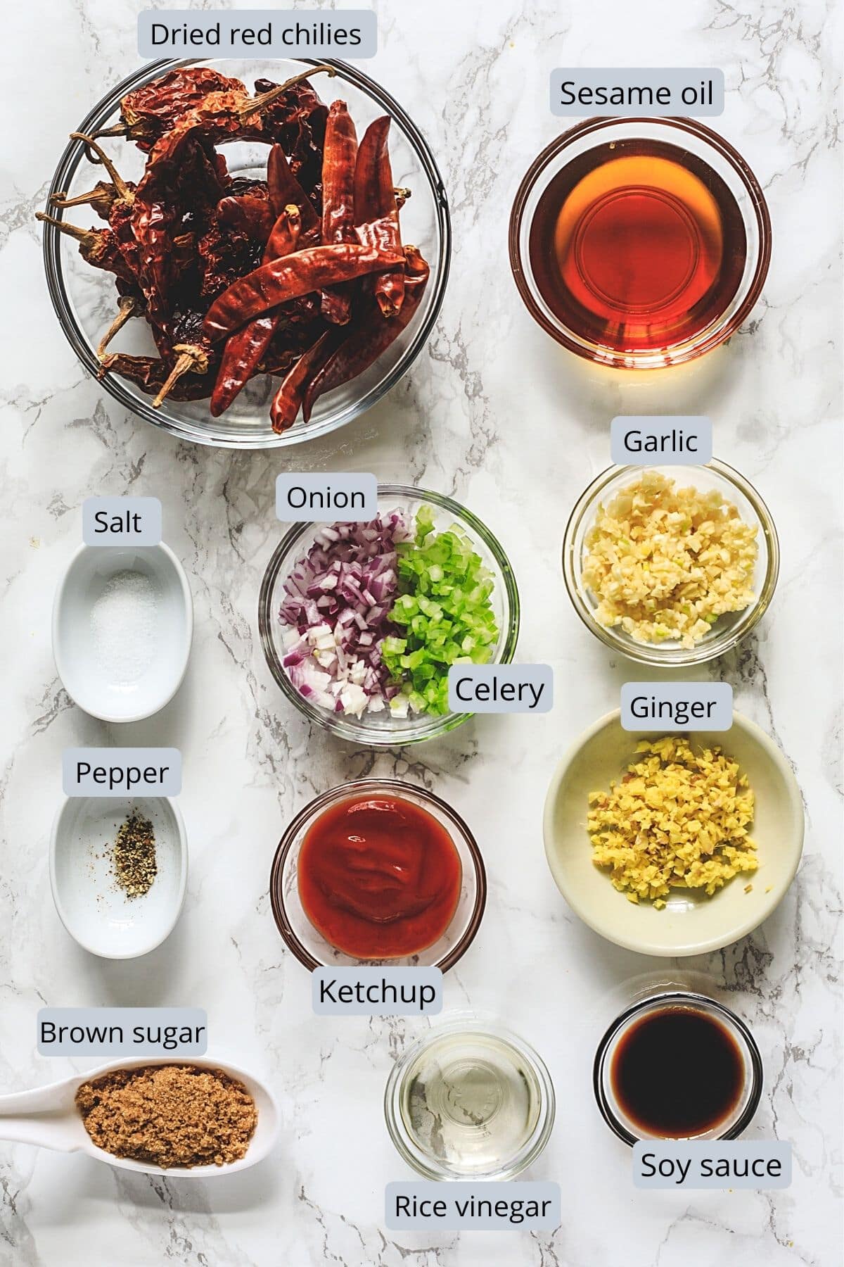 Ingredients used in schezwan sauce includes chilies, oil, onion, celery, ginger, garlic, vinegar, soy sauce, ketchup, sugar.