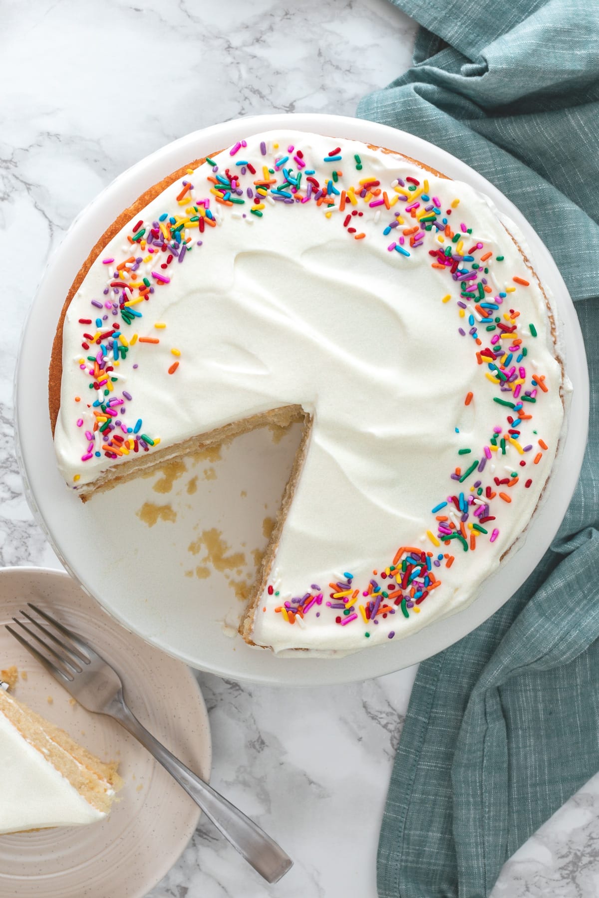 Top view of eggless cake with one slice is taken.