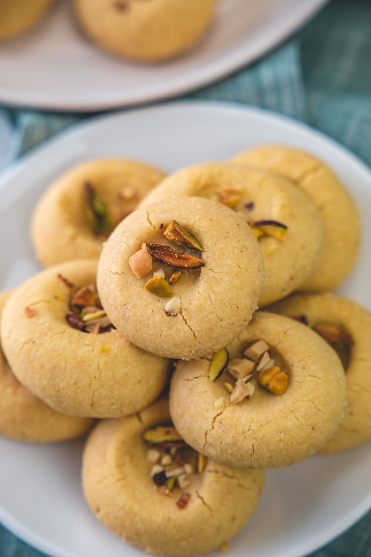 A stack of nankhatai in a plate.