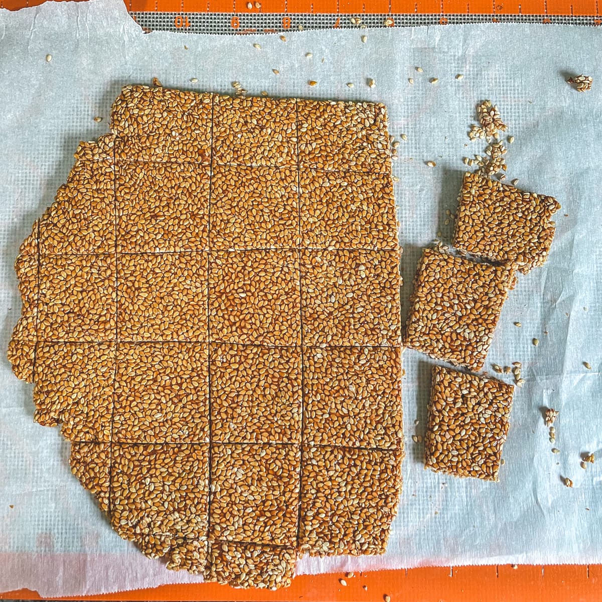 Til chikki on the parchment paper.