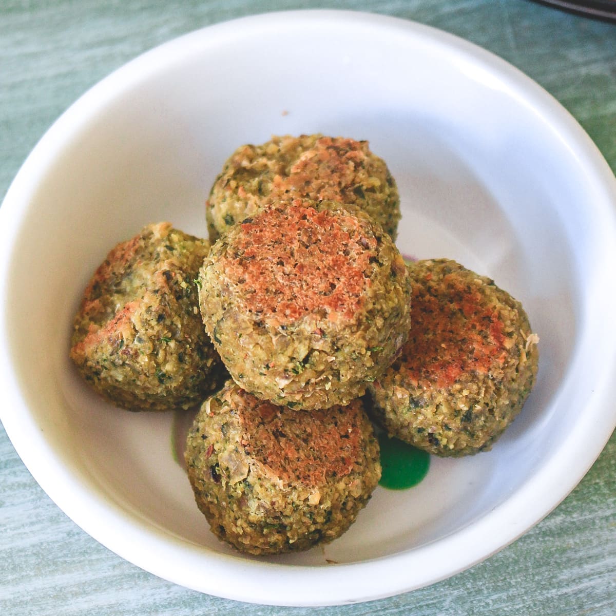 baked falafel served in a bowl.