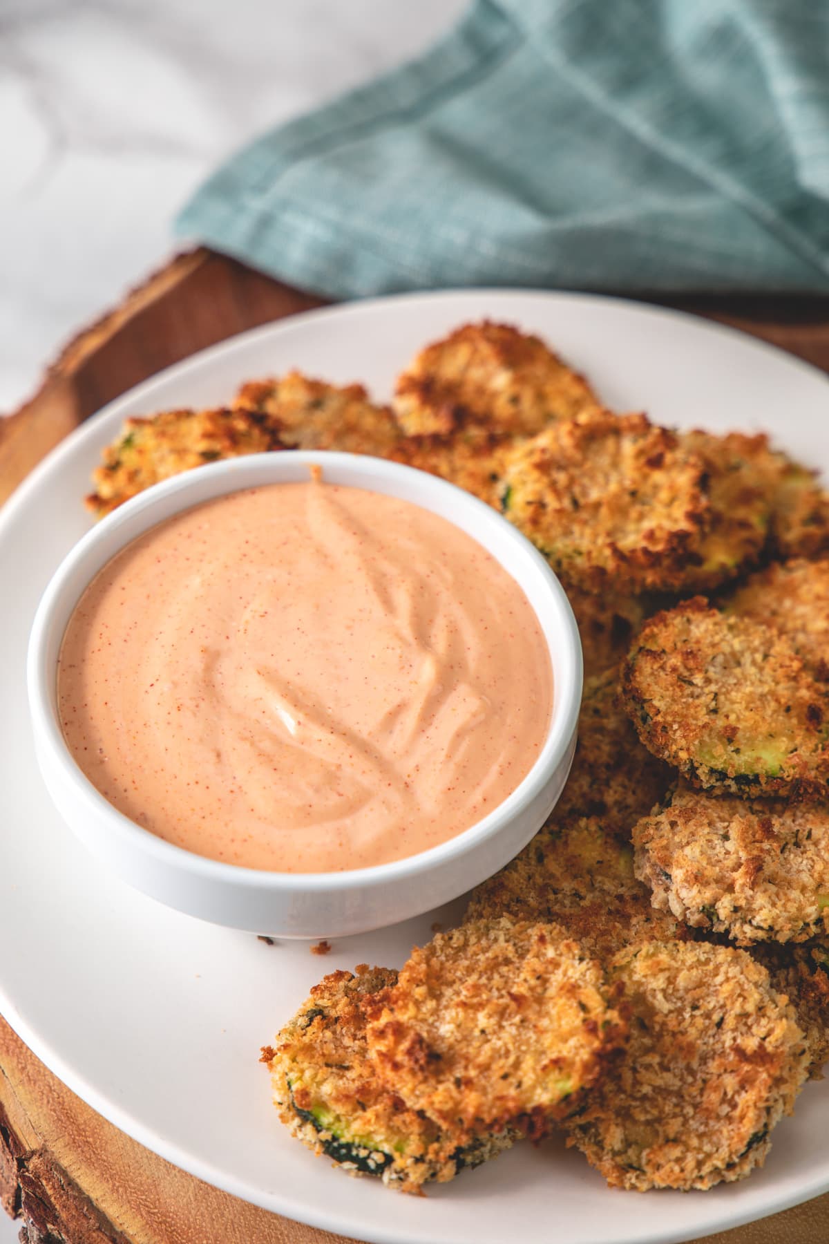 A bowl of fry sauce served with air fryer zucchini chips.