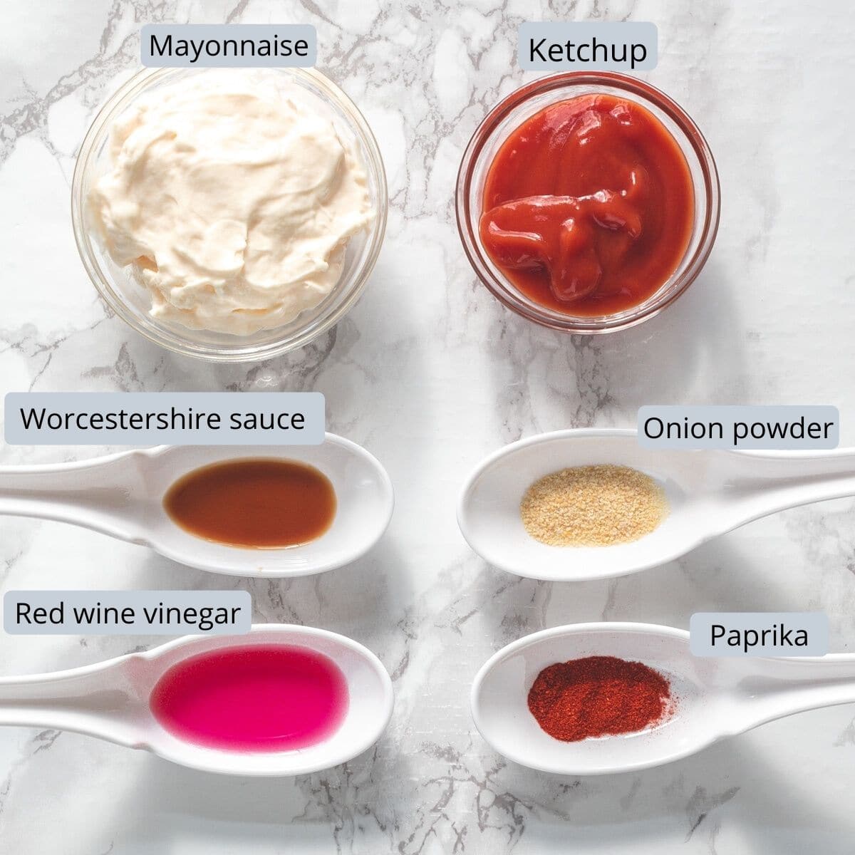 Ingredients used in fry sauce in individual bowls and spoons.