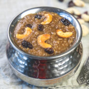 Sakkarai pongal garnish with fried cashews, raisins with napkin underneath.