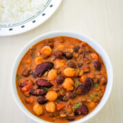 A bowl of mix kathol served with basmati rice on the side.