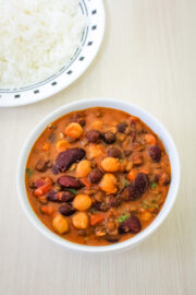 A bowl of mix kathol served with basmati rice on the side.