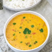 moong dal fry garnished with cilantro and served with rice.
