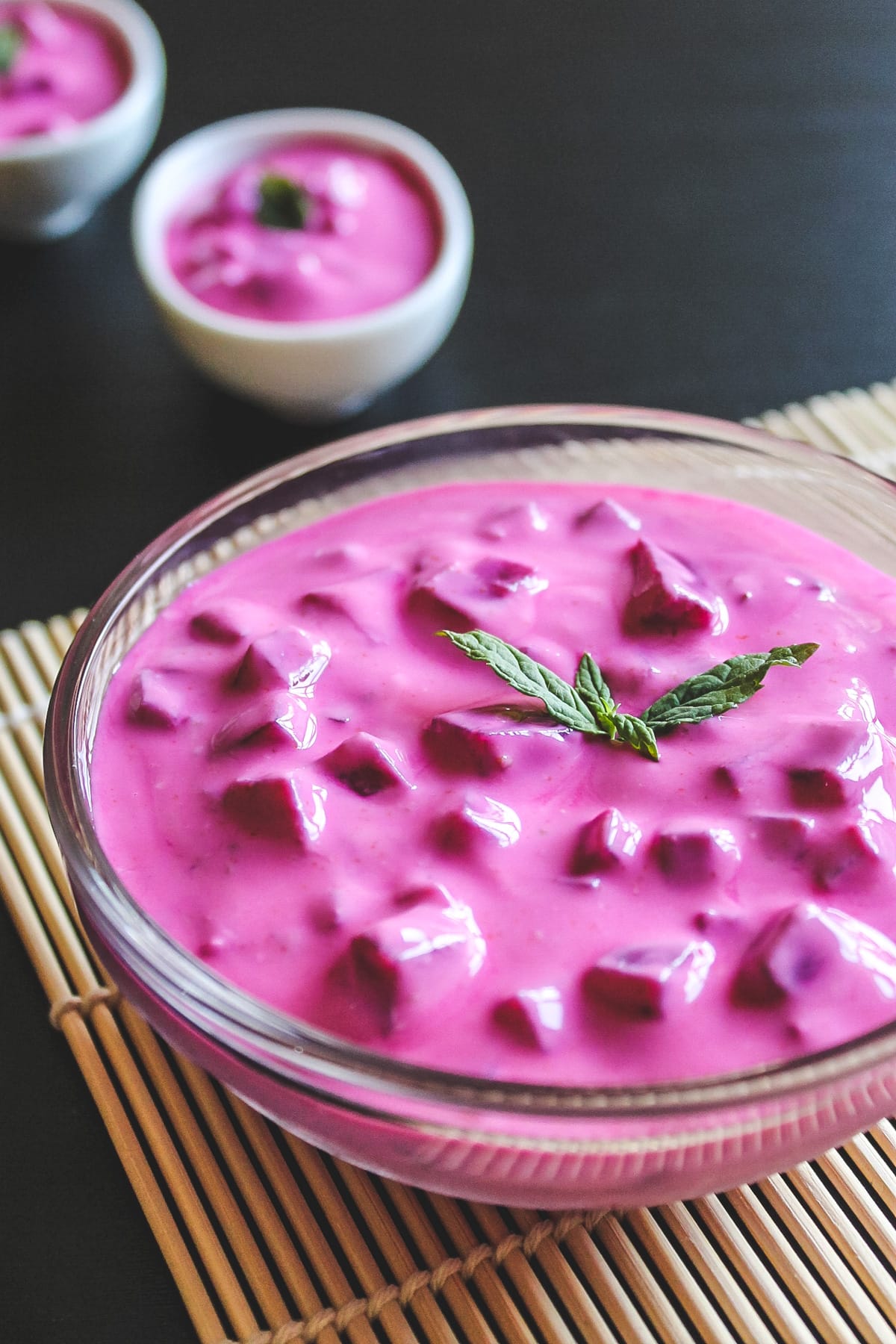 beetroot raita garnish with mint leaves.