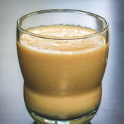 Chikoo milksgake served in the glass.