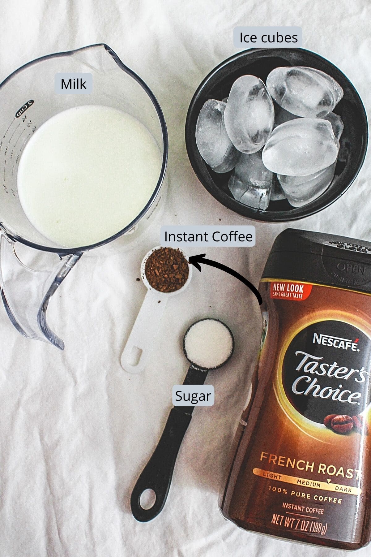 Cold coffee ingredients with labels.