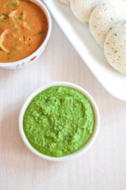 Green coconut chutney served with idli and sambar.