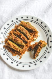 Bharwa bhindi served in a white plate.