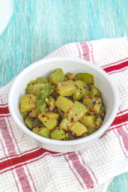 Lauki ki sabji served in a white bowl.