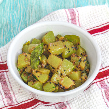 Lauki ki sabji served in a white bowl.