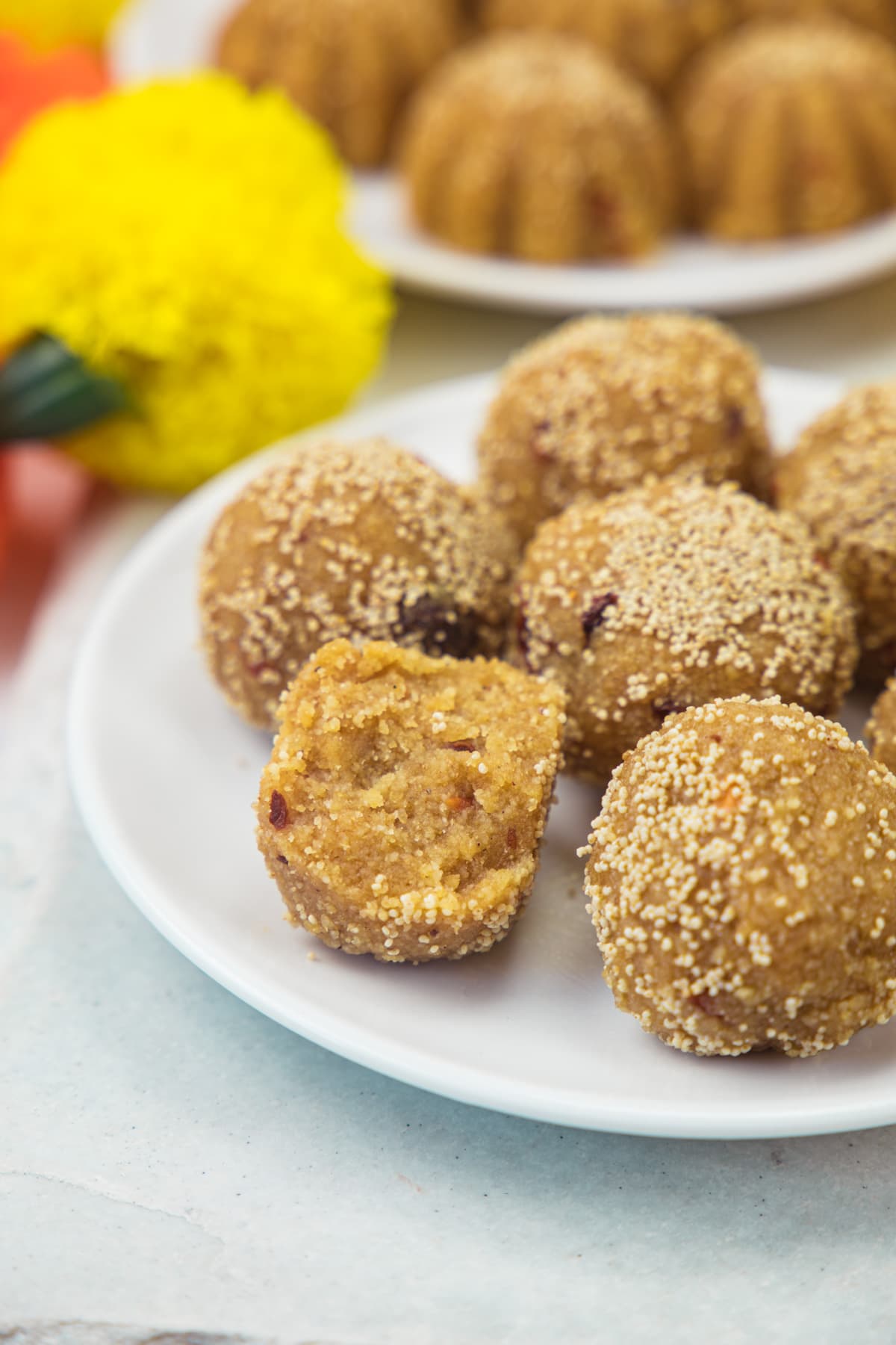 Half churma ladoo with few more in the plate.