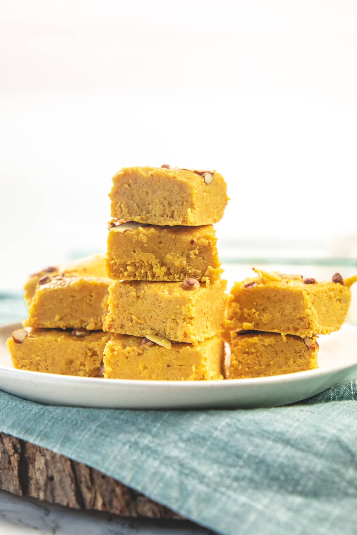 A stack of magas sweet barfi in a plate.