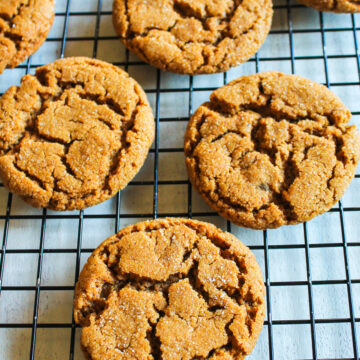 Eggless molasses cookies on a cooling rack.