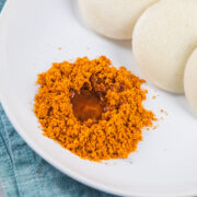 Idli podi with a drizzle of sesame oil with idli.