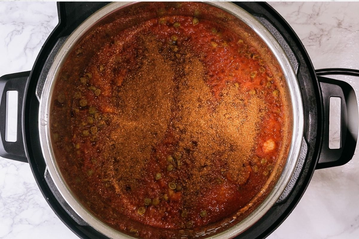 Adding pav bhaji masala.
