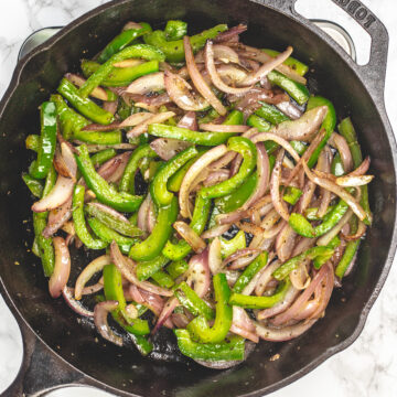 Chipotle fajita veggies in cast iron pan.