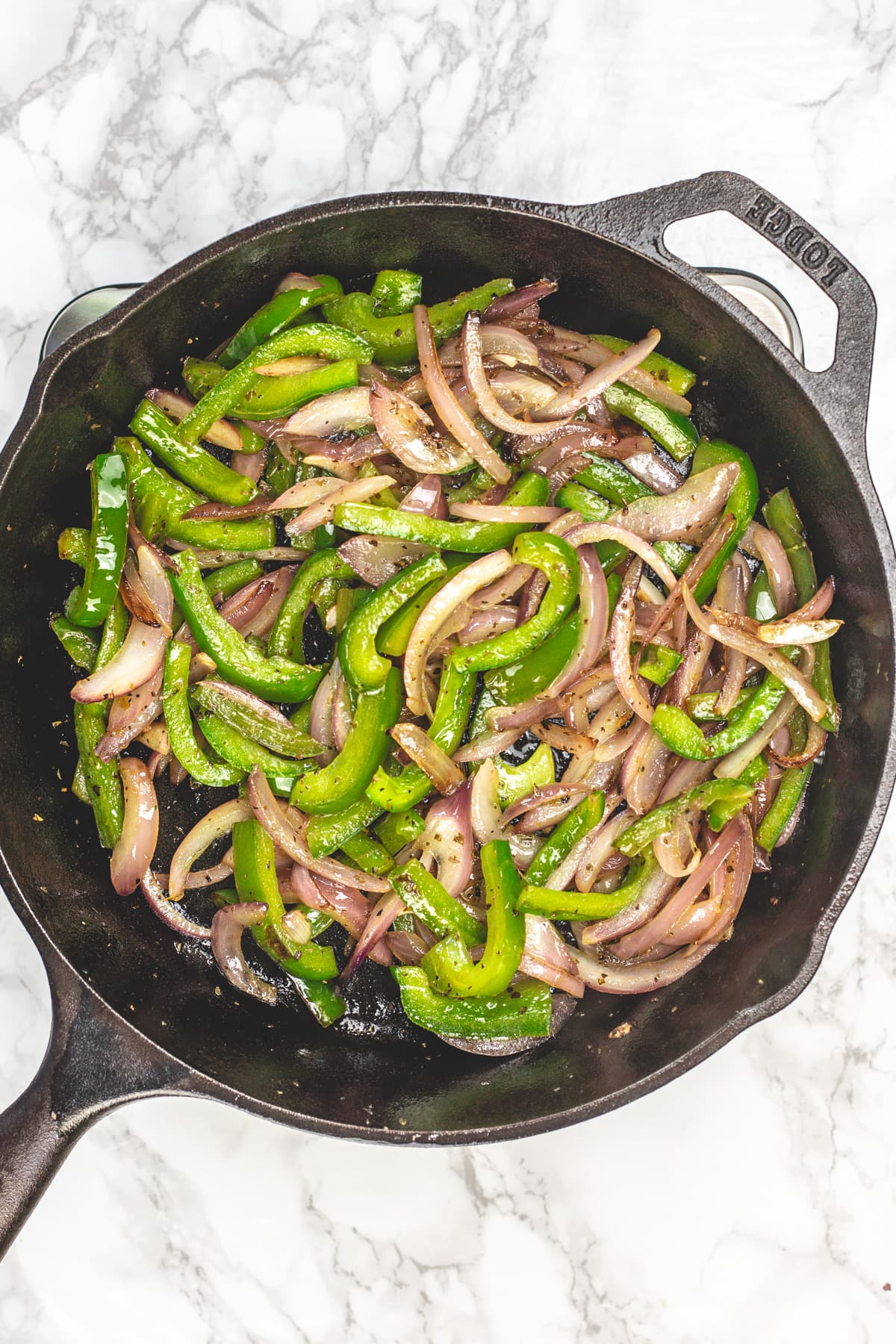 Chipotle fajita veggies in cast iron pan.