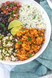 Chipotle sofritas served as a burrito bowl with rice, salsa, black beans and corn salsa.