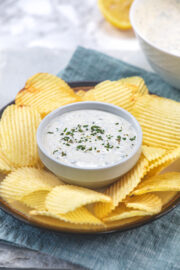 Sour cream dip served with ruffles chips.