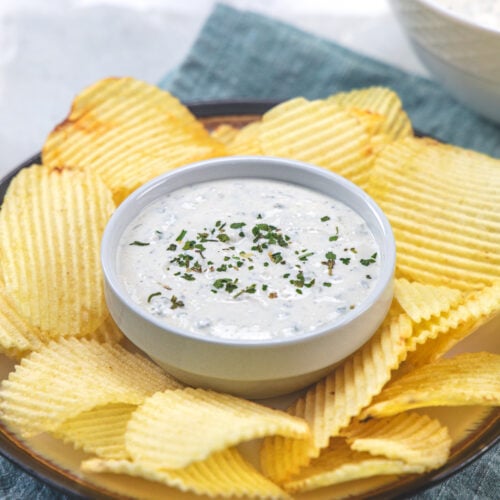 Sour cream dip served with ruffles chips.