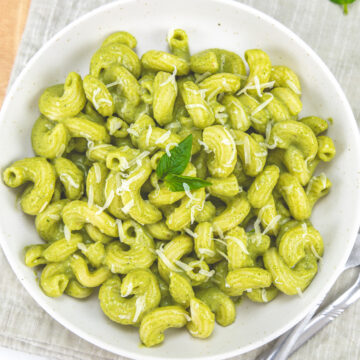 Zucchini pasta plate with forks on the side and napkin under the plate.