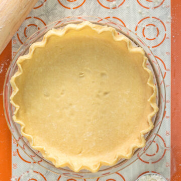 Unbaked food processor pie crust in 9-inch pie plate.