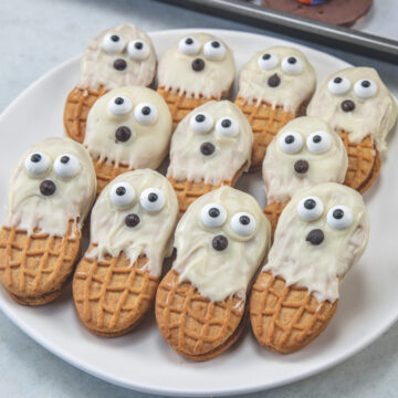 Ghost cookies in a white plate