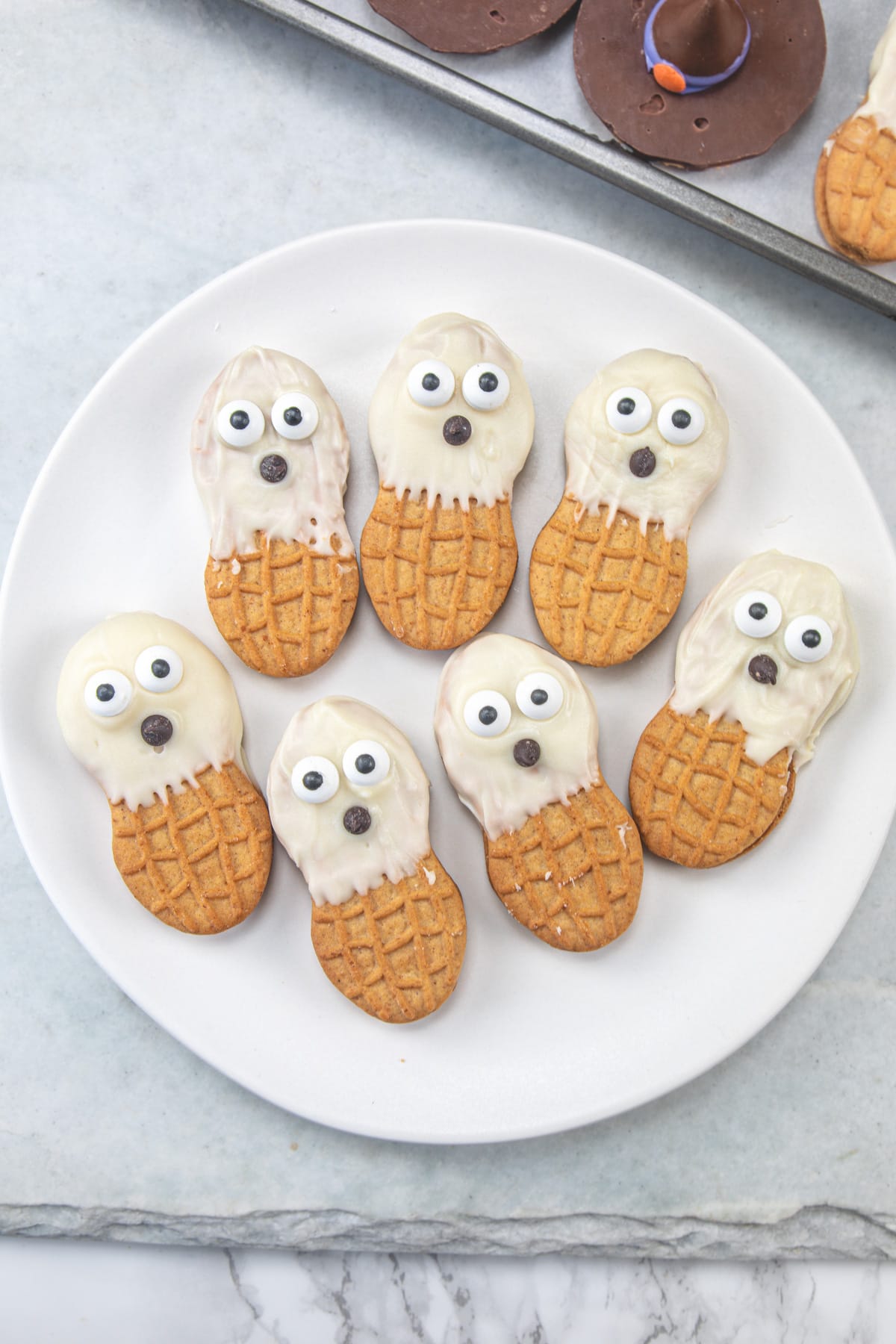 Nutter butter ghosts arranged in a plate.