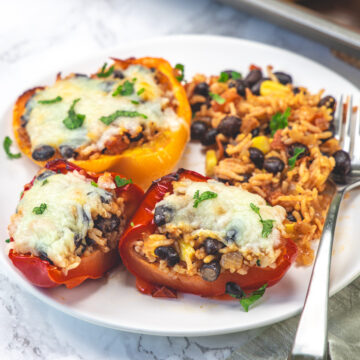 Cut open the vegetarian stuffed pepper garnished with cilantro.