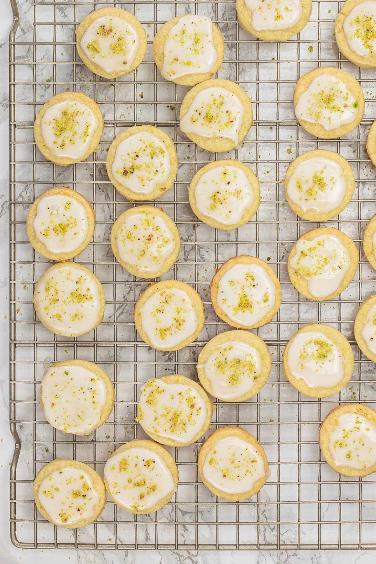 Lemon Shortbread Cookies on a cooling rack.